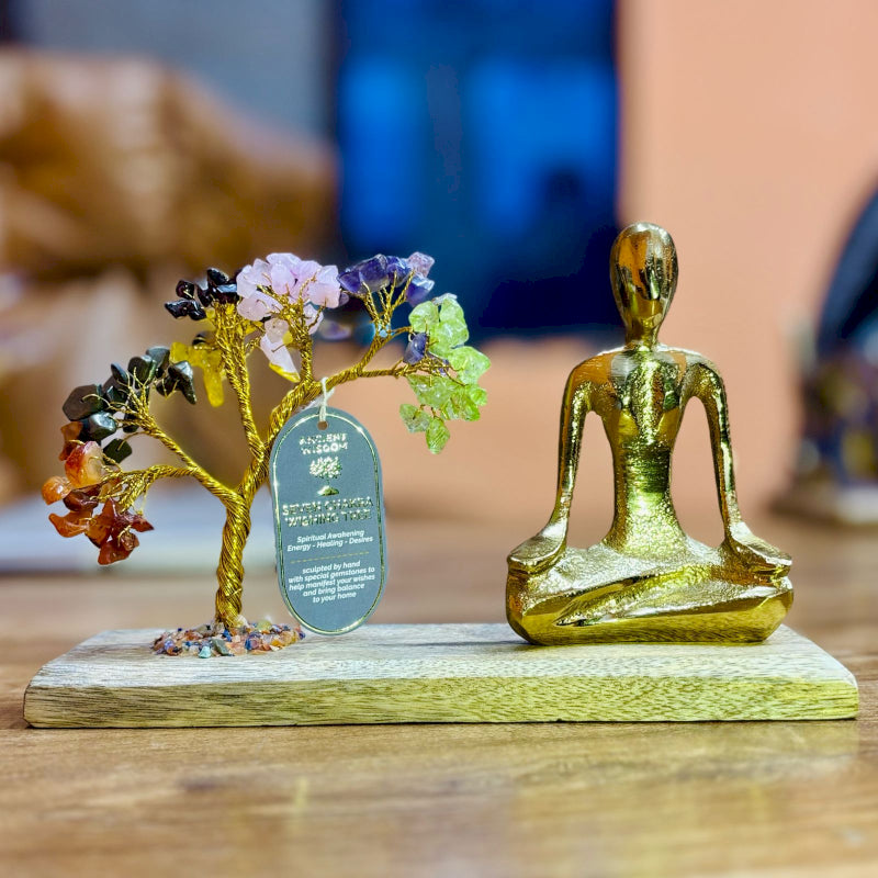 Seven Chakra Yoga Garden with gold statue doing Mudra Pose on wooden base